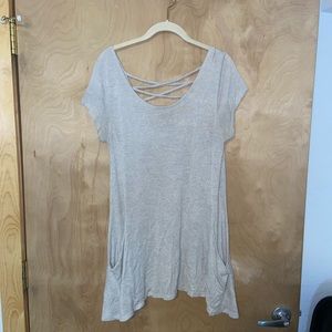 Long shirt with criss cross back and front pockets